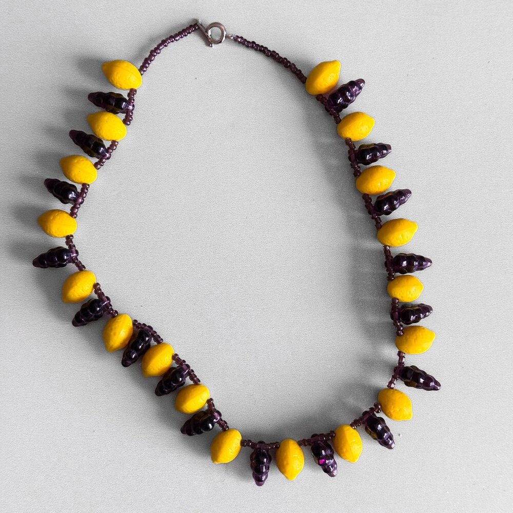 Fruit necklace lemons and grapes